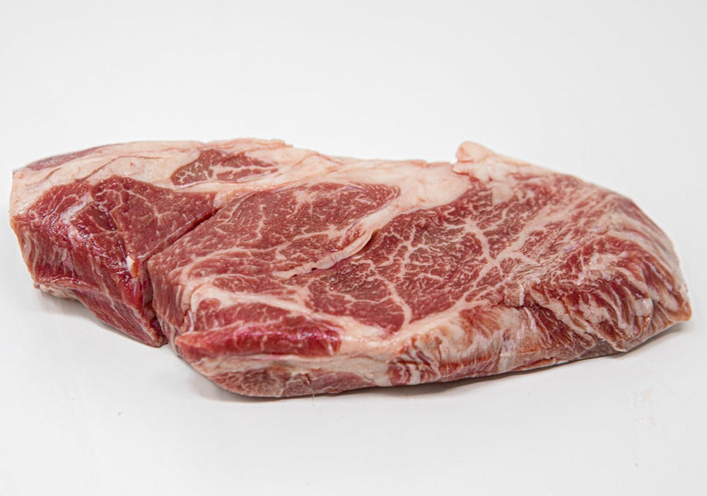 Kosher Wagyu Chuck Eye Steak with intense marbling available at Chu's Meat Market.