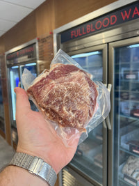 osher Fullblood American Wagyu beef cheeks available at Chu's Meat Market, elegantly presented on a marble countertop.
